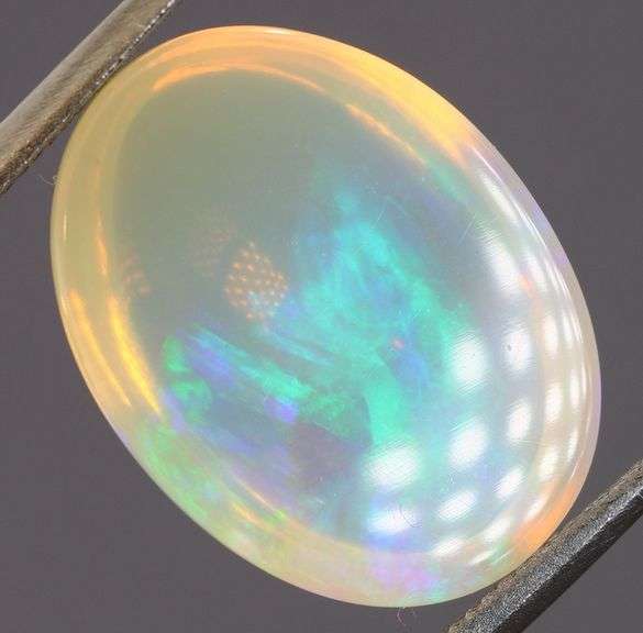 Gorgeous green and indigo flashing 5.03ct Jelly Opal