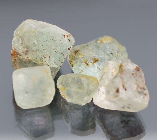 304ct uncut light blue Topaz set