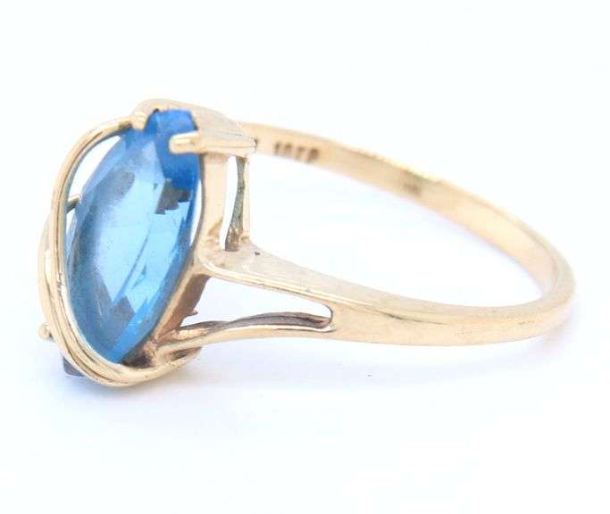 Lot of 2 10kt black onyx and blue topaz marquise rings