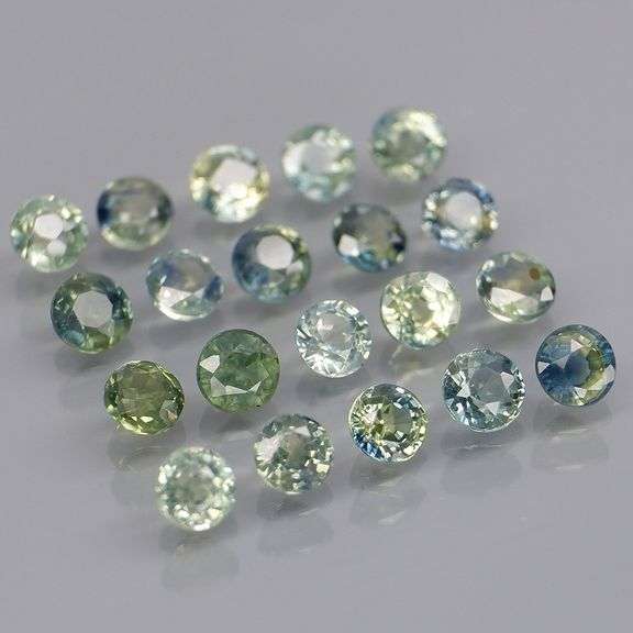 Heated only! 3.32ct blue green Sapphire set