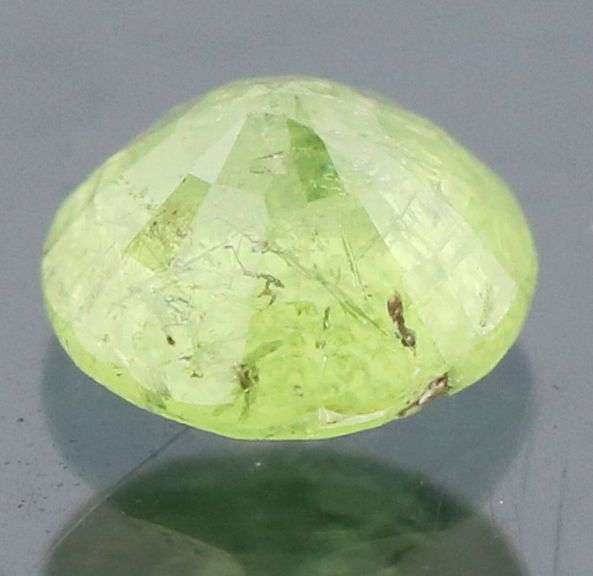Pale green .56ct untreated Demantoid Garnet