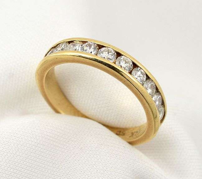 Flashy 1 Ct. T.W. Channel Set Diamond Band