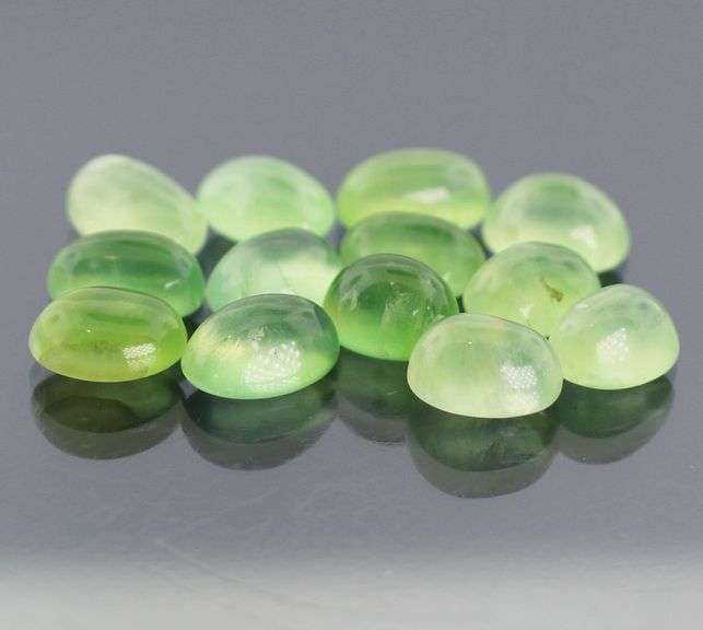 Huge 67.45ct untreated Prehnite cabochon set