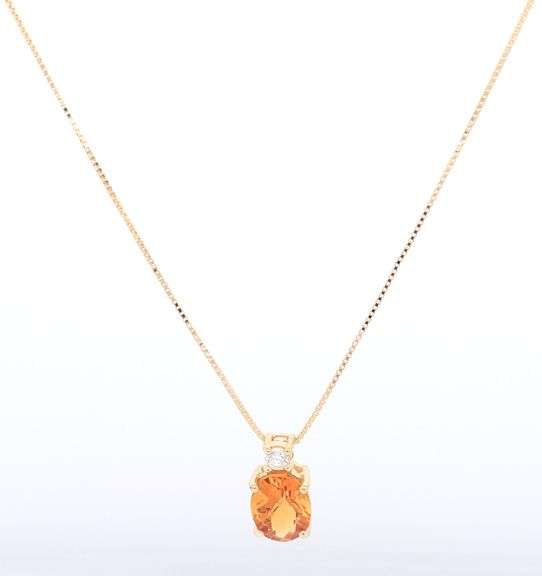 14kt Yellow Gold Oval Citrine and Diamond Pendant on chain