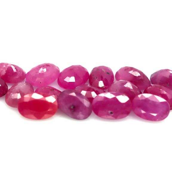 Heated only! 11.26ct violet red Ruby set