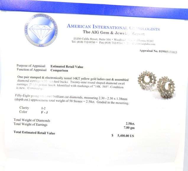 14kt Yellow gold 2.58ctw diamond swirl earrings