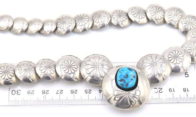 Navajo graduated sterling silver pillow turquoise stamped bead necklace