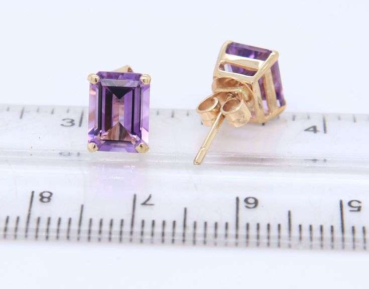 14kt Yellow gold emerald cut amethyst stud earrings