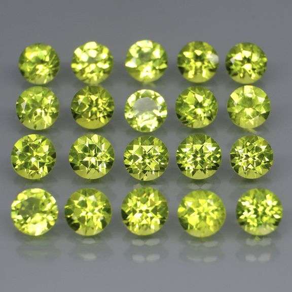 Fantastic 6.09ct 4mm round cut Peridot set
