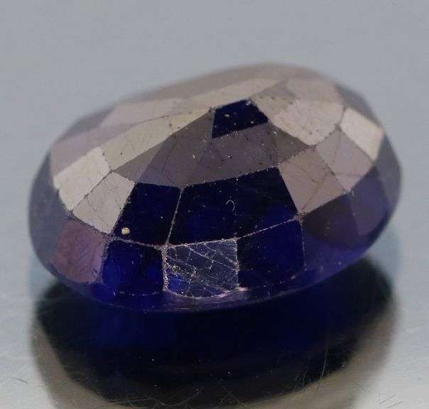 Dark blue 10.73ct glistening Sapphire