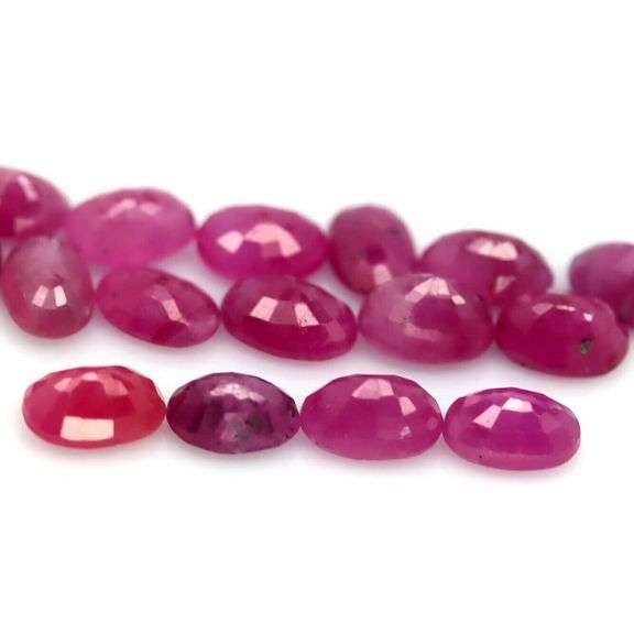 Heated only! 11.26ct violet red Ruby set