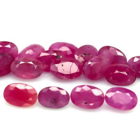 Heated only! 11.26ct violet red Ruby set