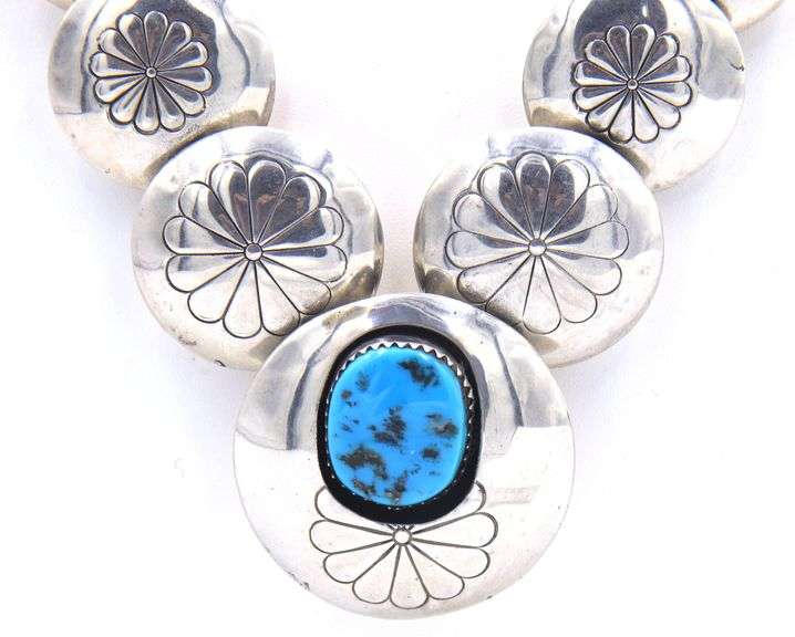 Navajo graduated sterling silver pillow turquoise stamped bead necklace