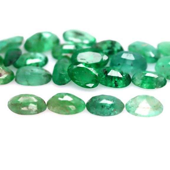 Oval cut 5.28ct Zambian Emerald set