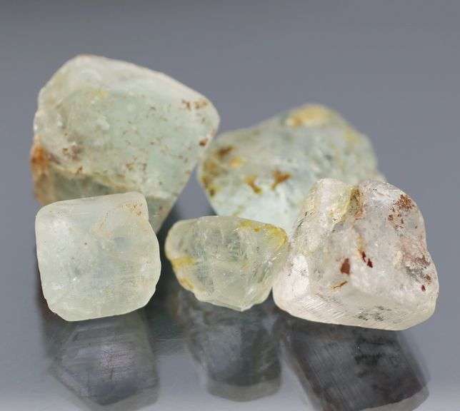 304ct uncut light blue Topaz set