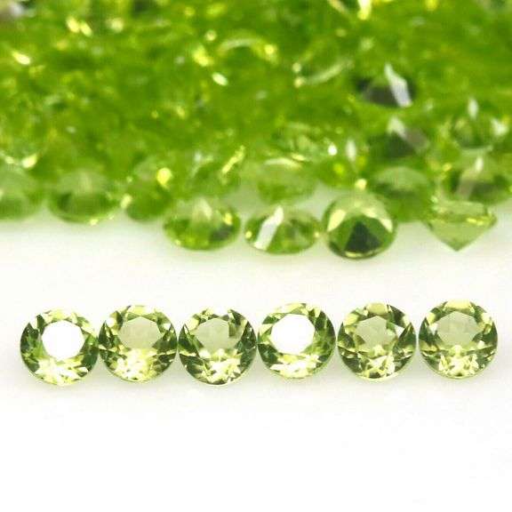 Dazzling 12.02ct untreated apple green Peridot set
