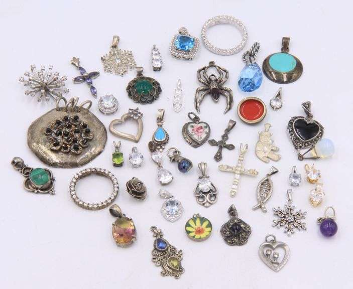 Group lot of vintage 925 sterling silver charms and pendants