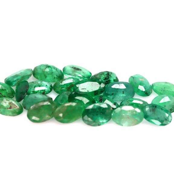 Oval cut 5.28ct Zambian Emerald set