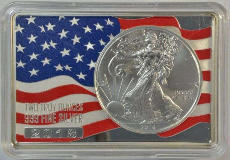 Special 2 Troy Oz pure silver with a 2018 $1 Silver Eagle encased in 1 Troy Oz