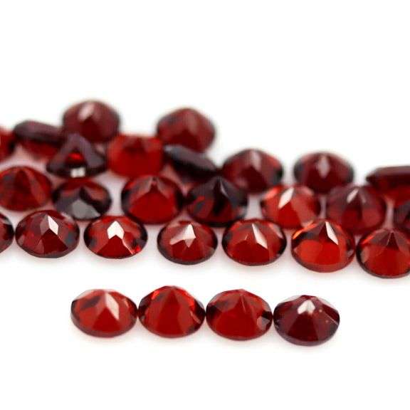 Ravishing wine red 11.90ct untreated Garnet set