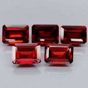 Nice 6.04ct emerald cut cherry red Garnet set