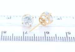 14kt Yellow gold 1.30ctw round brilliant cut diamond stud earrings
