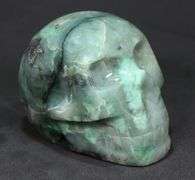 Detailed 1,760ct Emerald in matrix carving