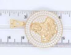 14kt Yellow gold round religious cubic zirconia pendant