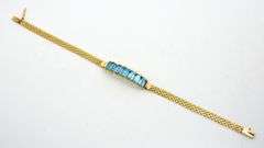 Attractive 14K YG Bracelet with Blue Topaz