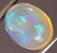Gorgeous green and indigo flashing 5.03ct Jelly Opal