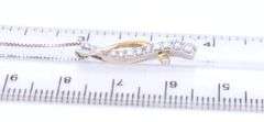 14kt White gold 0.25ctw 2 tone diamond Journey swirl pendant on chain necklace