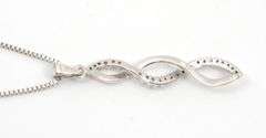White Gold Diamond Swirl Pendant on Necklace
