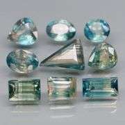 Stunning blue green 4.27ct mixed cut Sapphire set