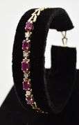 Desirable 10K Yellow Gold Ruby and Diamond Bracelet
