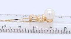 14kt Yellow gold 7.5mm pearl and diamond pendant on chain necklace