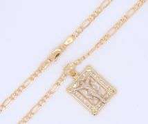 14kt Yellow gold square Jesus crucifix pendant on figaro chain necklace