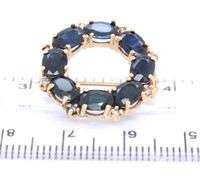 14kt Yellow gold oval blue sapphire and diamond circle brooch