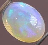 Gorgeous green and indigo flashing 5.03ct Jelly Opal