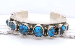 Heavy signed 925 sterling silver turquoise cuff bangle