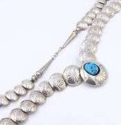 Navajo graduated sterling silver pillow turquoise stamped bead necklace