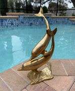 1970s Hollywood Regency Solid Brass Swimming Dolphins Sculpture 16 Inch