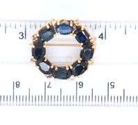 14kt Yellow gold oval blue sapphire and diamond circle brooch