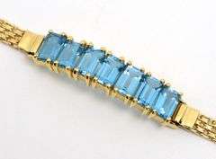 Attractive 14K YG Bracelet with Blue Topaz