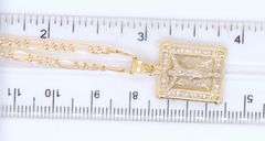 14kt Yellow gold square Jesus crucifix pendant on figaro chain necklace