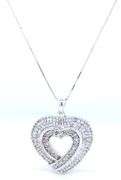 10kt White gold Baguette and round diamond heart shaped pendant on chain necklace