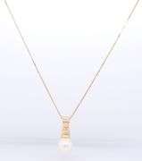 14kt Yellow gold 7.5mm pearl and diamond pendant on chain necklace