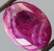 Outstanding 38.35ct bi-color Ruby cabochon -Heated only!