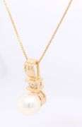 14kt Yellow gold 7.5mm pearl and diamond pendant on chain necklace