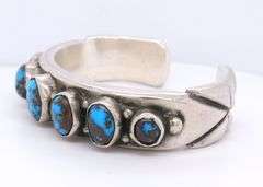 Heavy signed 925 sterling silver turquoise cuff bangle