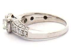 1.32ctw Round Diamond Halo Engagement Ring in 18K